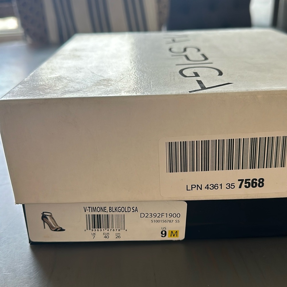 Black and gold via spica designer heels!